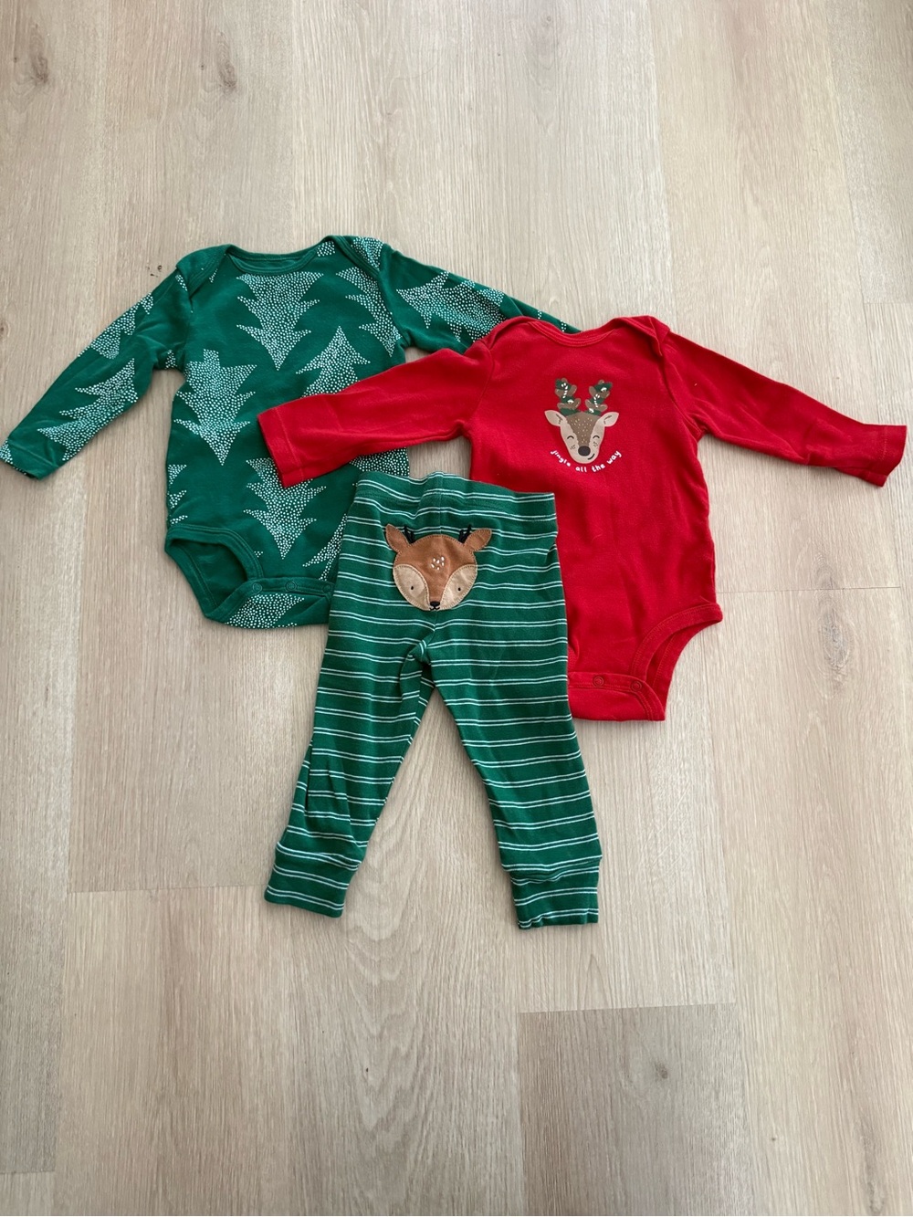 Carter’s Christmas onsies (2) and pants (1)